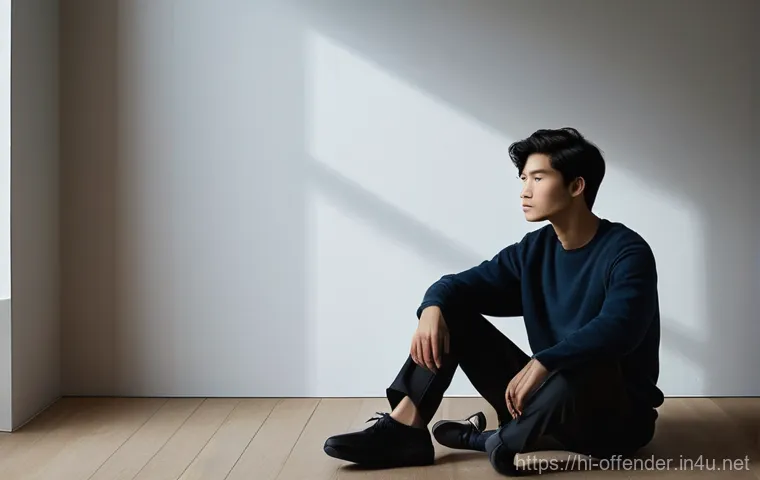범죄 유형별 가해자 인터뷰 사례 - **Prompt:** A young adult, male or female, sitting alone in a dimly lit, minimalist room. Their post...